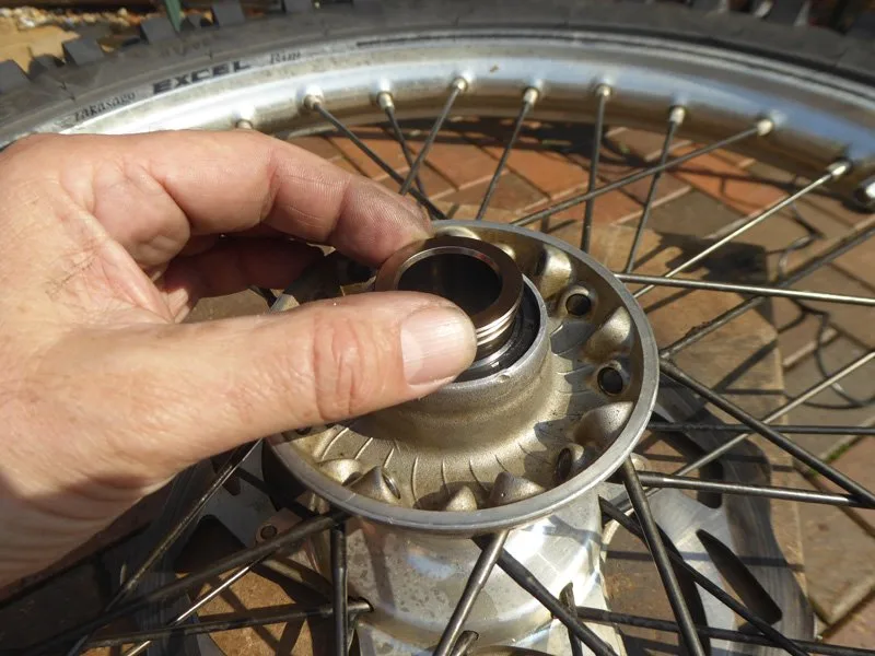Wheel-Bearing-change-1 – Wheel bearing replacement on a dirt bike is an occupational hazard. On (Motorcycle Maintenance)