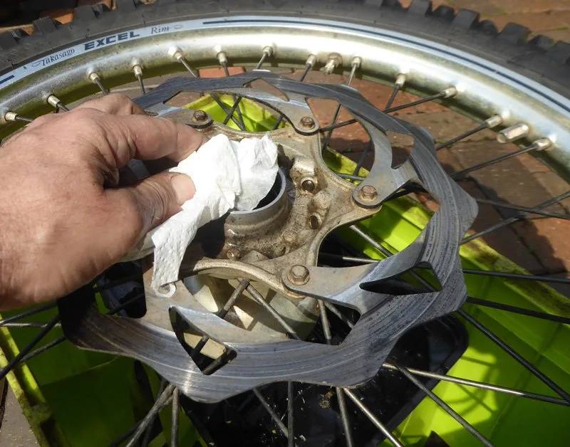 Wheel-bearing-change-14 – Wheel bearing replacement on a dirt bike is an occupational hazard. On (Motorcycle Maintenance)