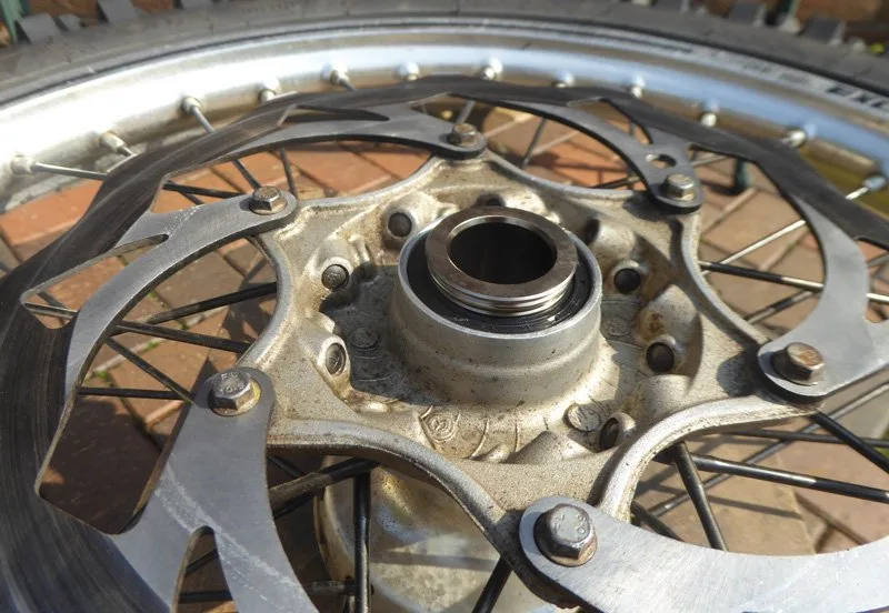 Wheel-bearing-change-5 – Wheel bearing replacement on a dirt bike is an occupational hazard. On (Motorcycle Maintenance)