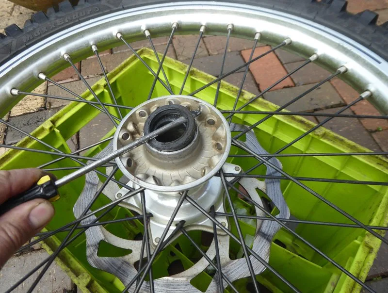 Wheel-bearing-change – Wheel bearing replacement on a dirt bike is an occupational hazard. On (Motorcycle Maintenance)