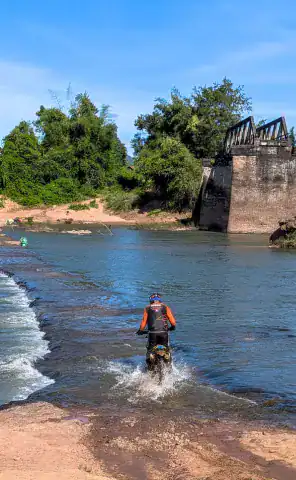 Ride Expeditions - Motorcycle Tours - Ho Chi Minh Trail - Experience fun river crossings - either by boat or getting your feet wet!