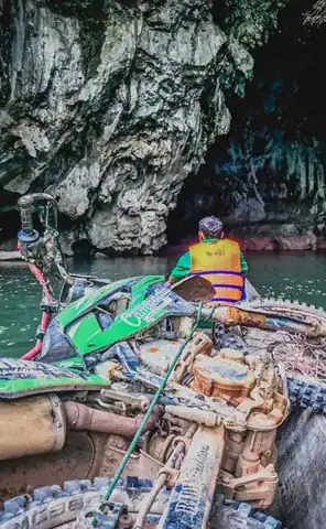 Ride Expeditions - Motorcycle Tours - Ho Chi Minh Trail - Take a boat trip through a cave nearly seven kilometres long (with your bike!)