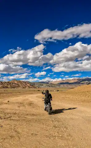 Ride across the wide-open high-altitude plains of Hanle, where the landscape feels closer to Mongolia than India