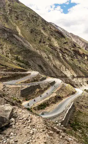 Sweep through endless hairpins, dramatic valleys and wide-open plains that feel closer to Mongolia than India