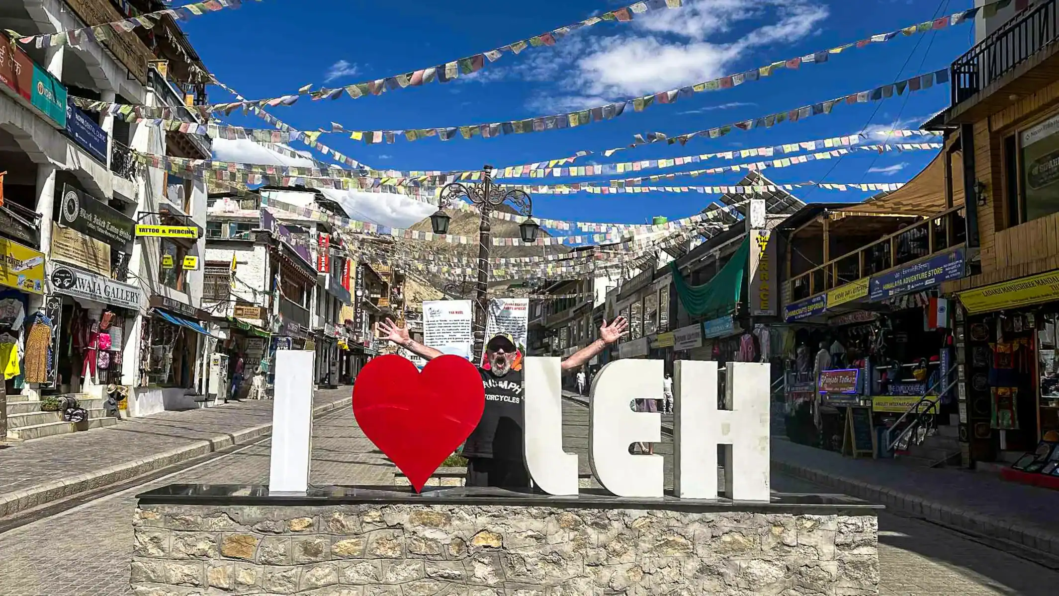 guided-motorcycle-tour-india-leh-town-sign-06