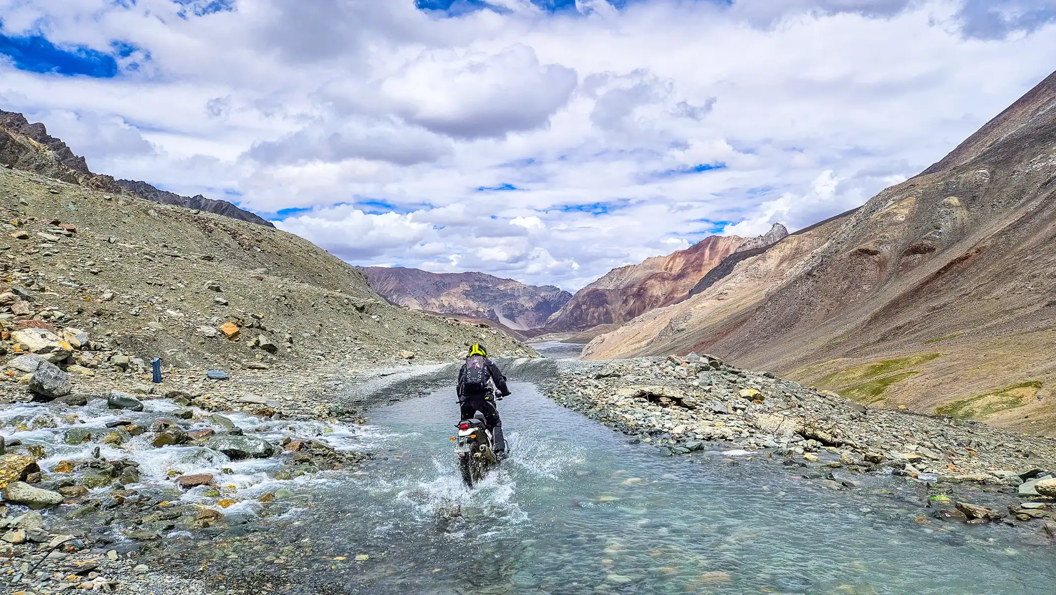 india-motorcycle-tour-himalayas-river-crossing-rider-16