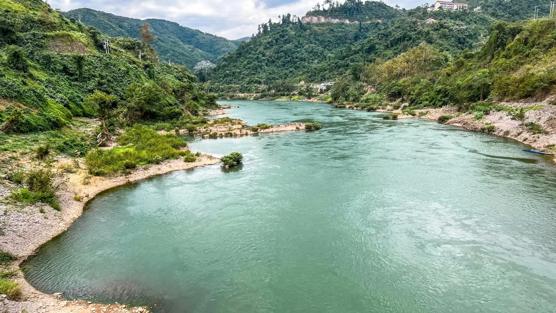 laos-dirt-bike-tour-river-bend-mountain-scenery-15
