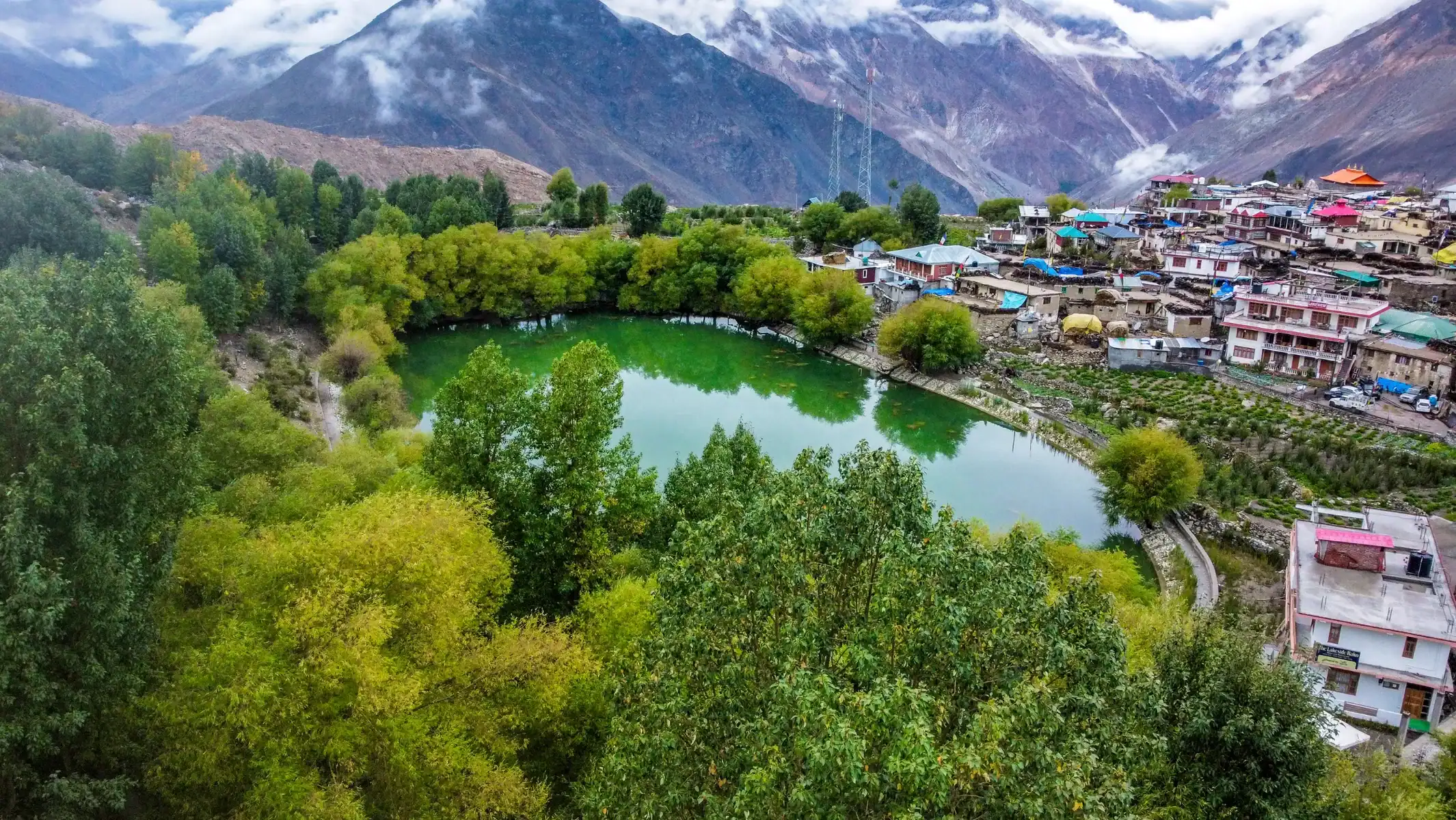 royal-enfield-motorcycle-tour-himalayas-river-valley-landscape-14