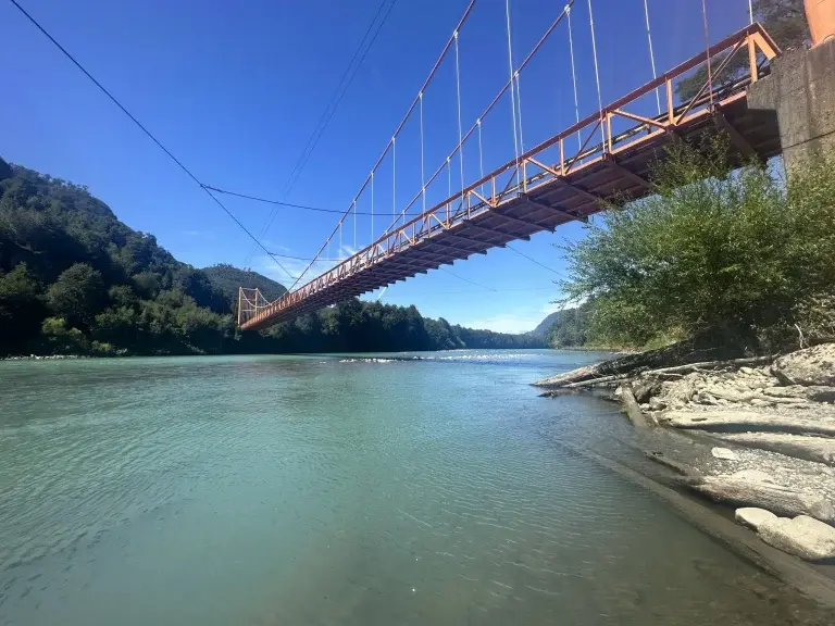 Riding across a bridge in Patagonia.