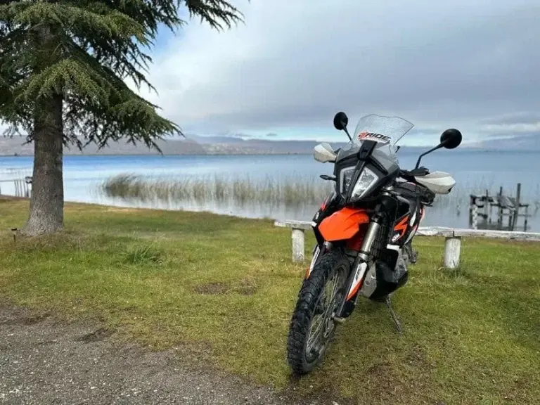 A KTM 890 Adventure R next to Lago Posadas in Patagonia.