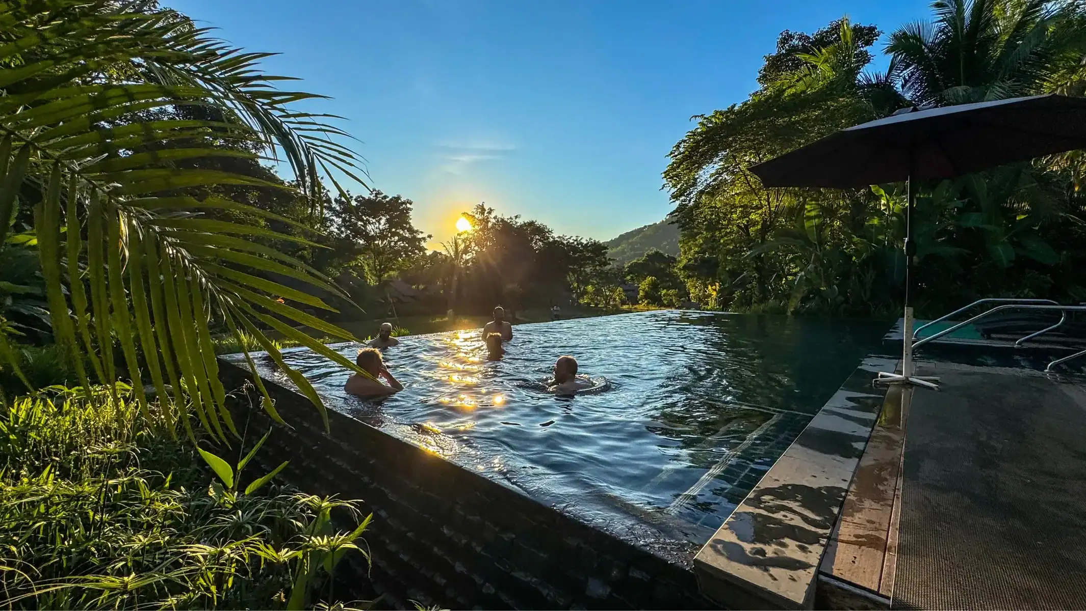 thailand-dirt-bike-tour-hotel-pool-sunset-swim-03