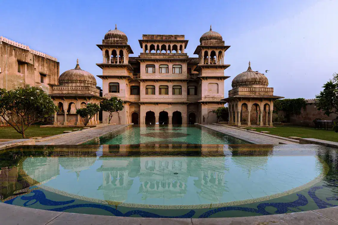 An outdoor view of the Castle Mandawa Hotel's majestic pool