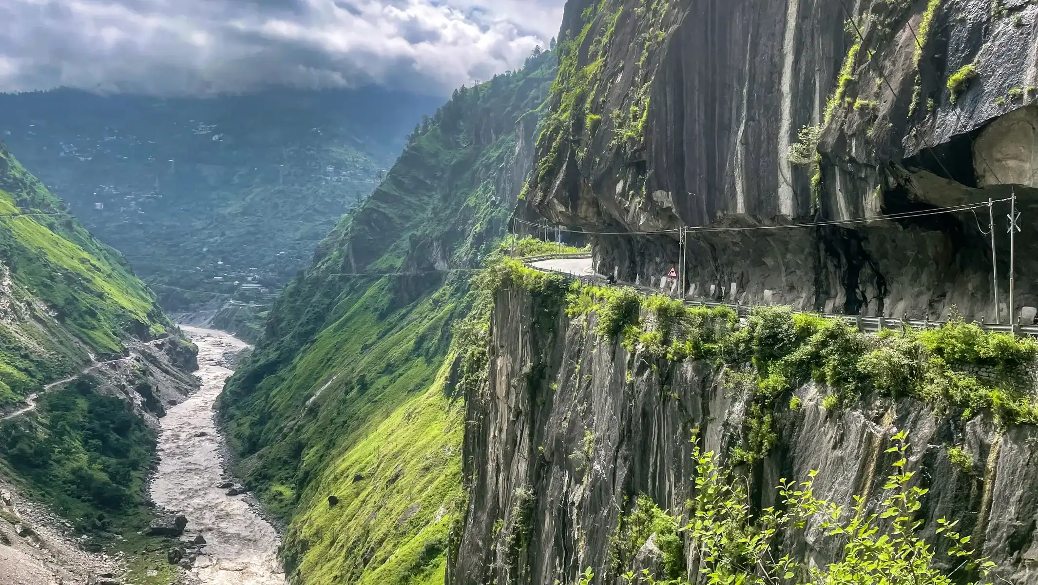best-motorcycle-tour-himalayas-cliffside-mountain-road-11