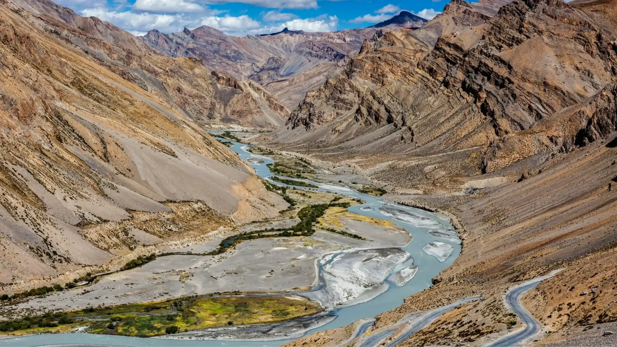 best-motorcycle-tour-himalayas-river-valley-aerial-23