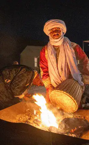 Morocco - Desert camp with campfire and local musician(s)