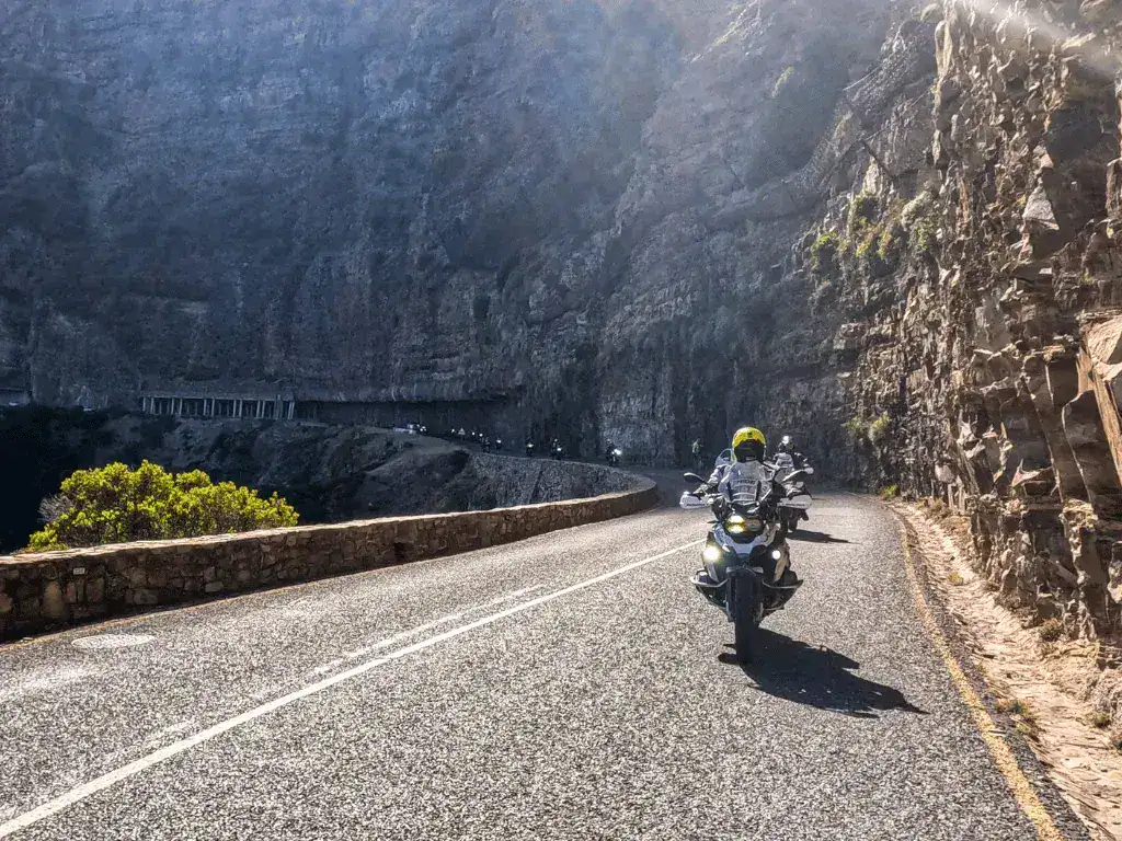 Riding adventure bikes along Chapman’s Peak Drive on the Ride Expeditions self-guided motorcycle tour.
